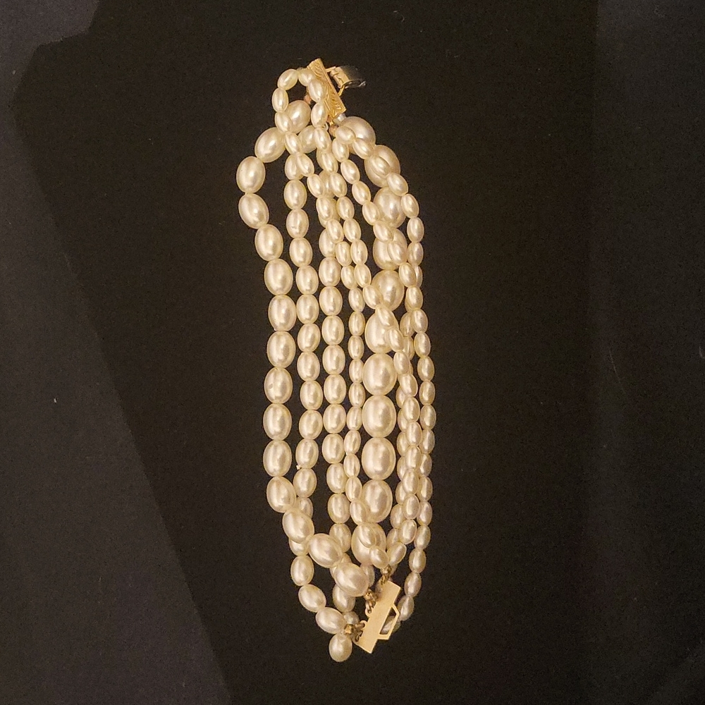 7 strand faux pearl statement bracelet with faux gold clasp- 8 in